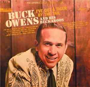 Buck Owens And His Buckaroos - I've Got A Tiger By The Tail