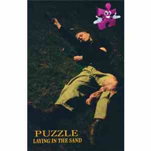 Puzzle - Laying In The Sand