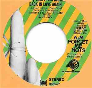 L.T.D. - (Every Time I Turn Around) Back In Love Again / Never Get Enough O ...