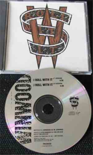 Steve Winwood - Roll With It
