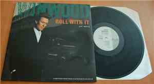 Steve Winwood - Roll With It
